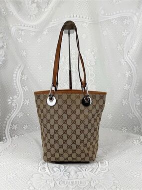 Gucci GG Canvas Shoulder Bag with Orange Trim